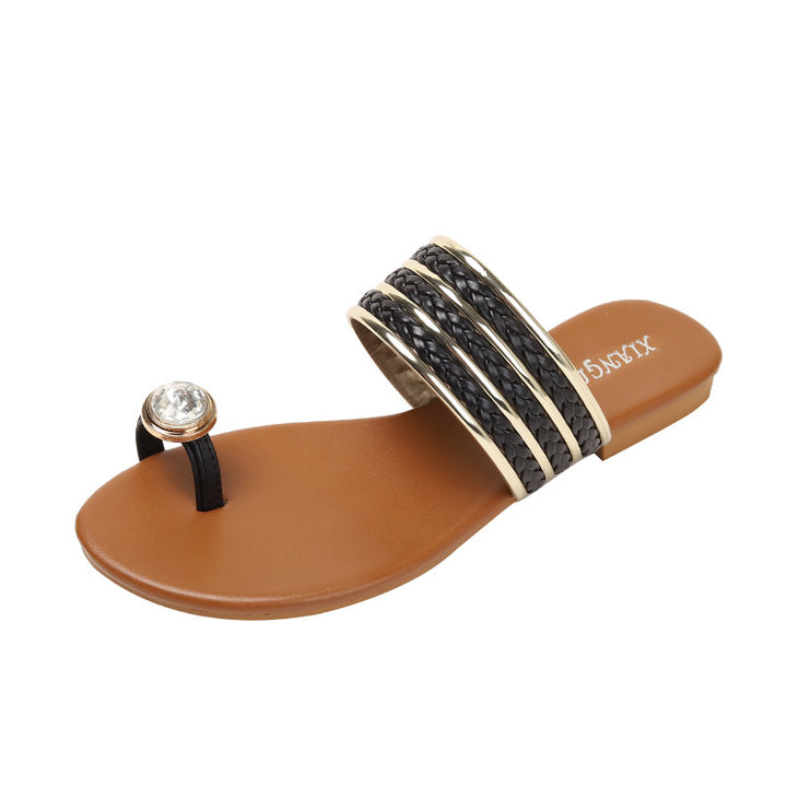 Dame flip-flops med flettede remme og funklende accent Stilla