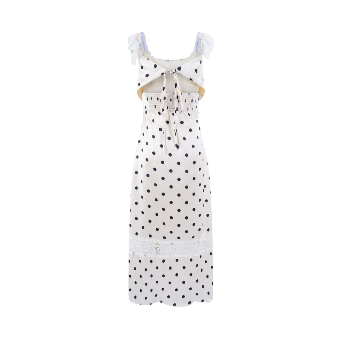 Dame polka-dot kjole med flæsedetaljer og spidse accenter Stilla