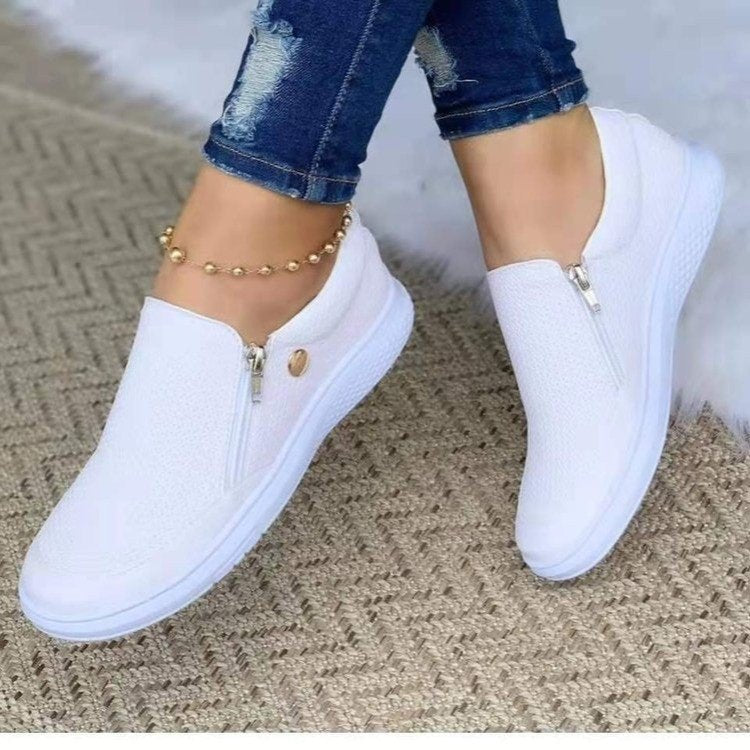 Dame Slip-On Sneakers med fashionable lynlåsdesign og åndbart overflade Stilla