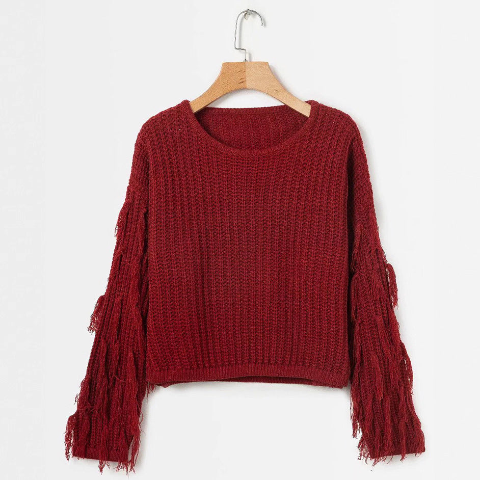 Kvindernes strikkede sweater med frynseærmer og en komfortabel pasform Stilla