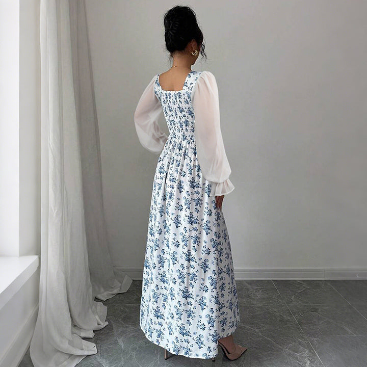 Dame Maxikjole med transparente pufærmer og blomsterdesign Stilla