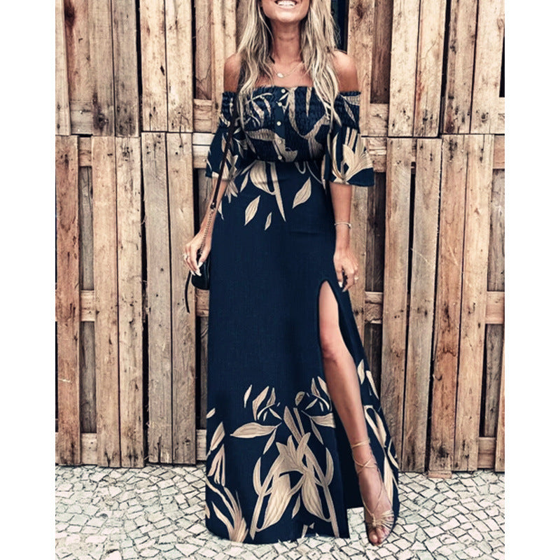 Dame maxikjole med skulderfri design og elegante blomstertryksdetaljer Skovae