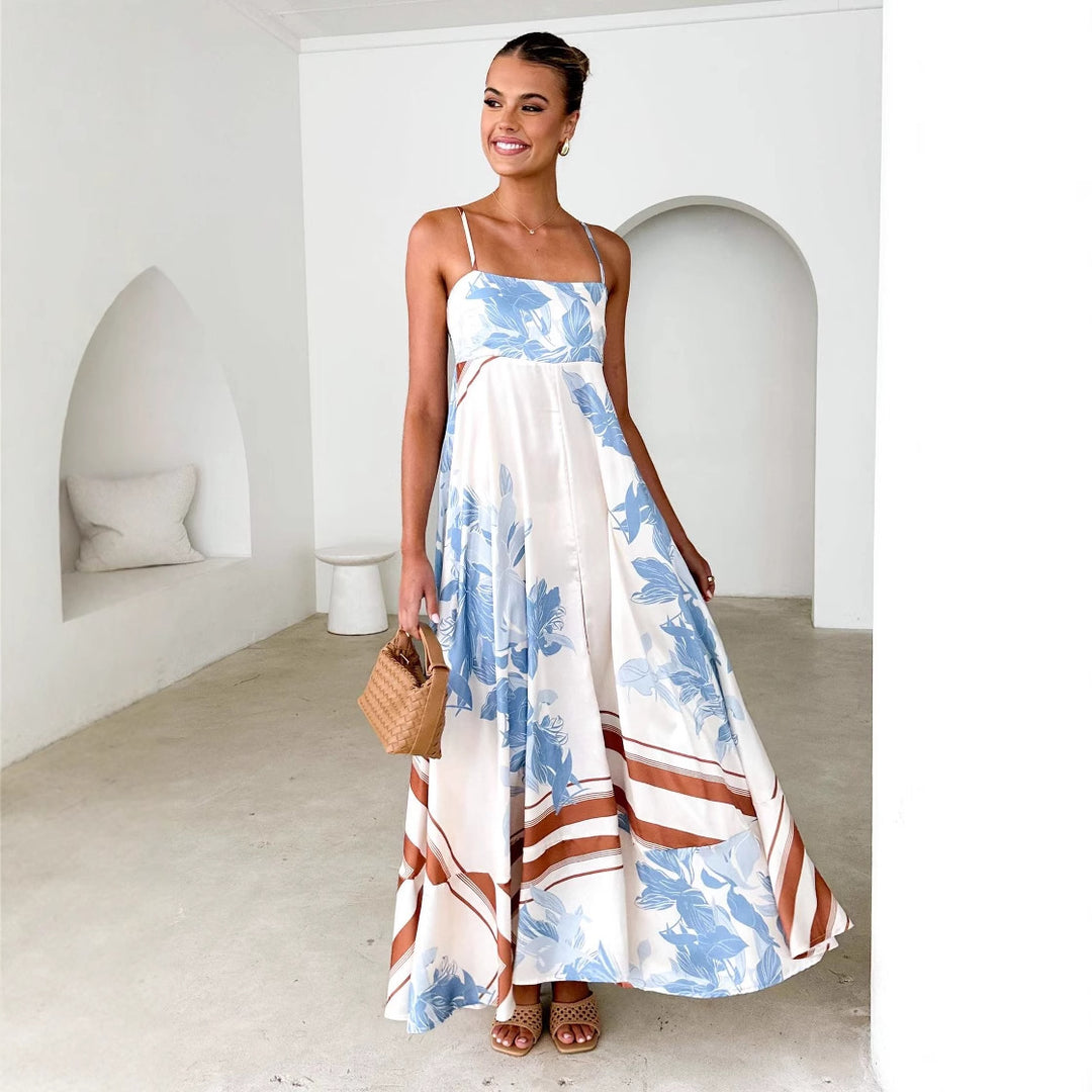 Dame maxikjole med elegant blomstret design og svajende skørt Stilla