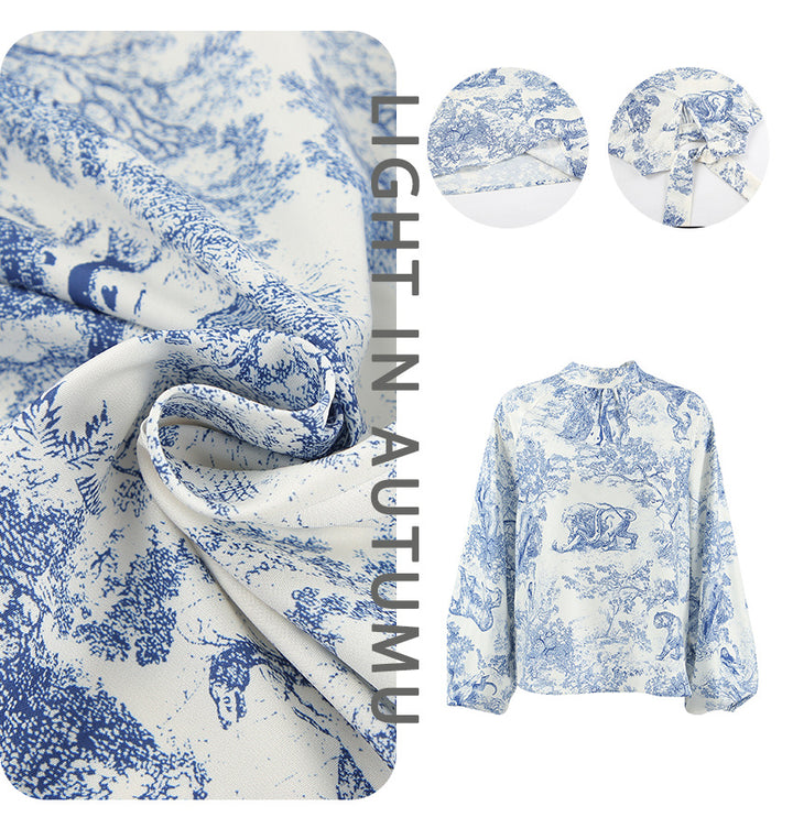 Damebluse med voluminøse ærmer og blomsterdesign Stilla