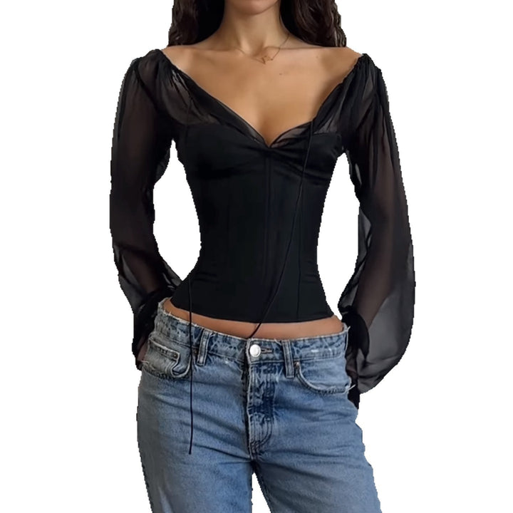 Dame elegant top med transparente ærmer og smal silhuet Skovae