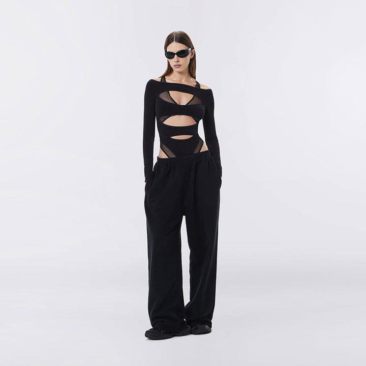 Dame bodystocking med kreativt cut-out-design og lange ærmer Stilla