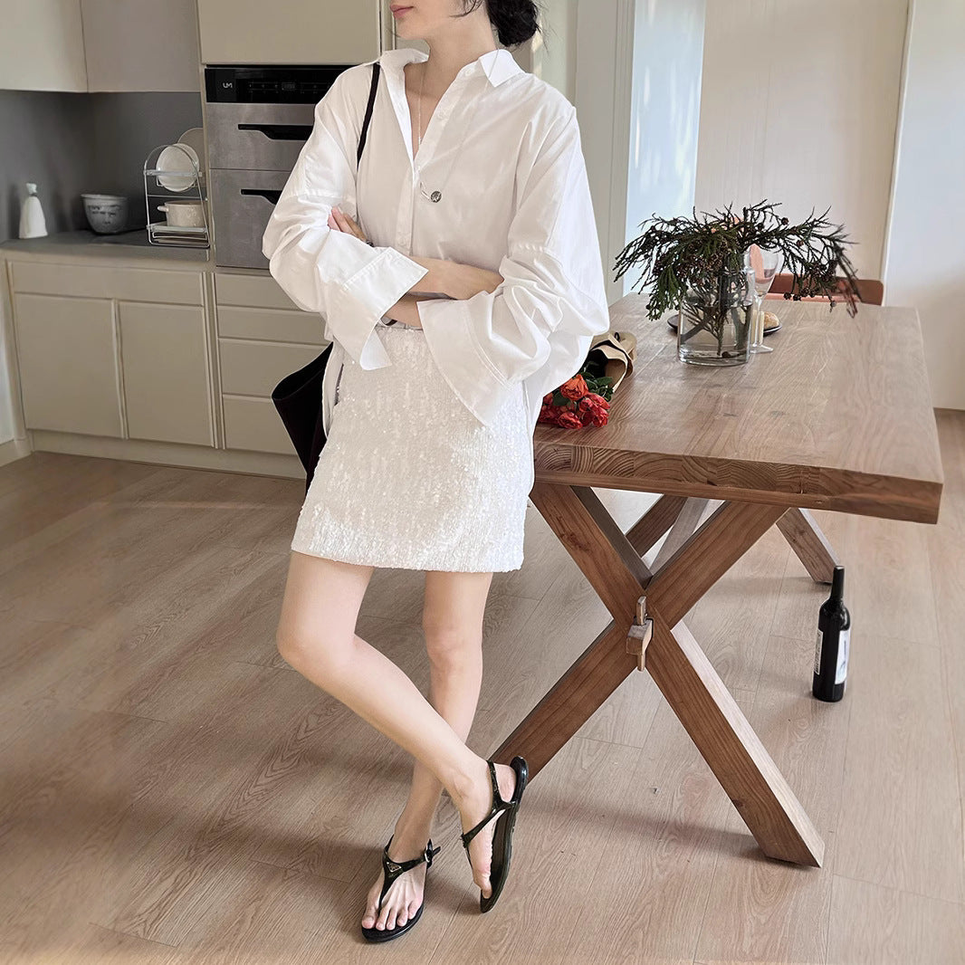 Dame glitrende mini nederdel med elastisk talje og trendy design Stilla