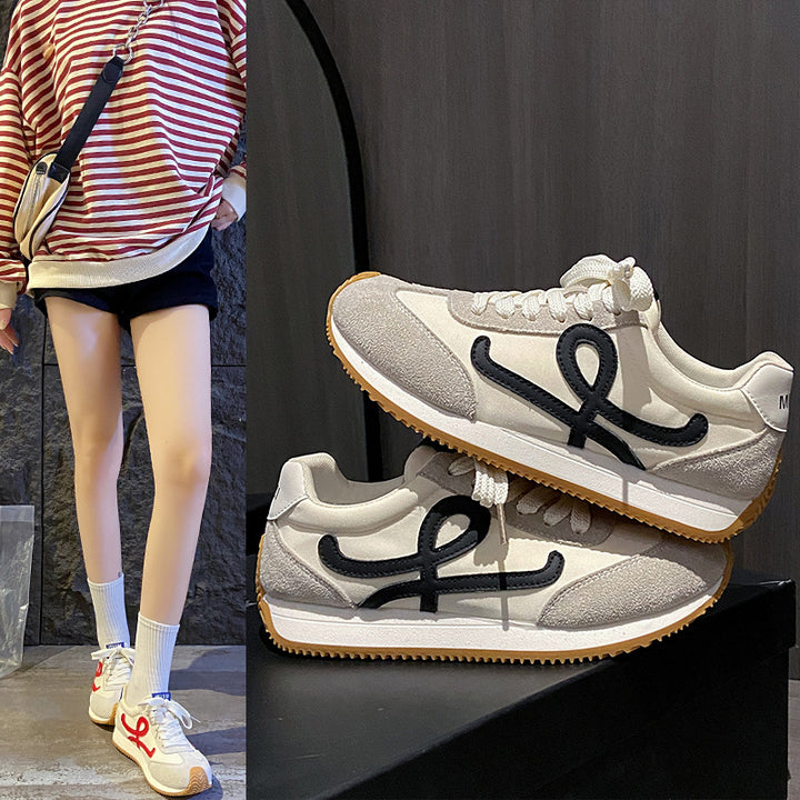 Dame Sporty Sneakers med stilfuld logo-detalje og åndbar overfladestruktur Stilla
