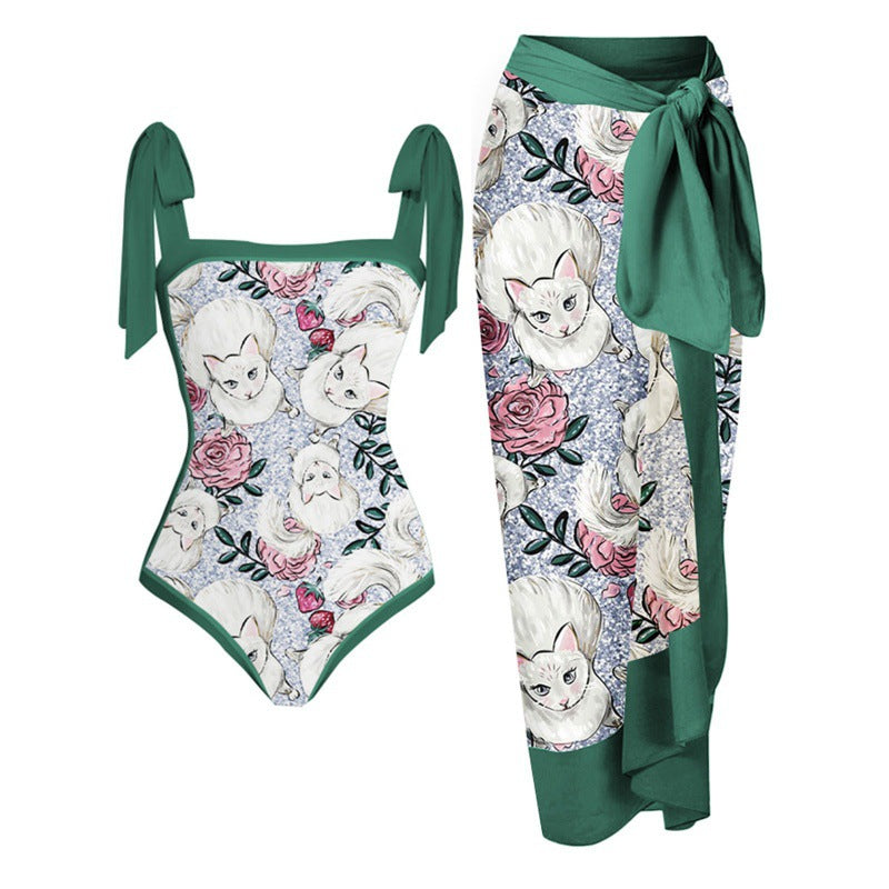 Dame one-piece badedragt med elegant indpakningsskørt og modige remme Skovae