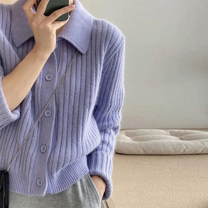 Dame cardigan med elegant knaplukning og ultramoderne ribbet design Stilla
