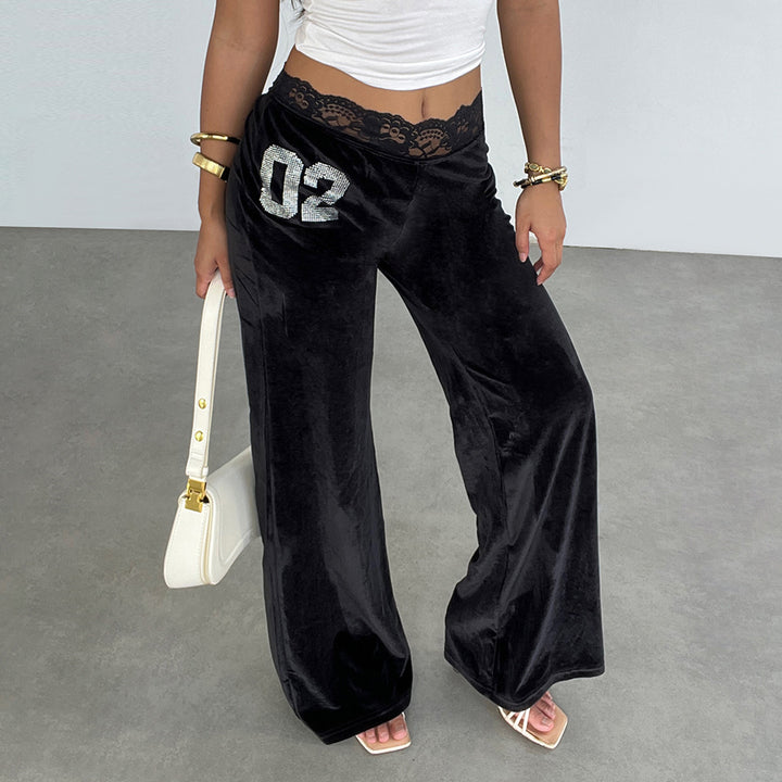 Damen elegante Flared-Hose aus weichem Material mit Spitzenbund und Glitzerakzenten Skovae