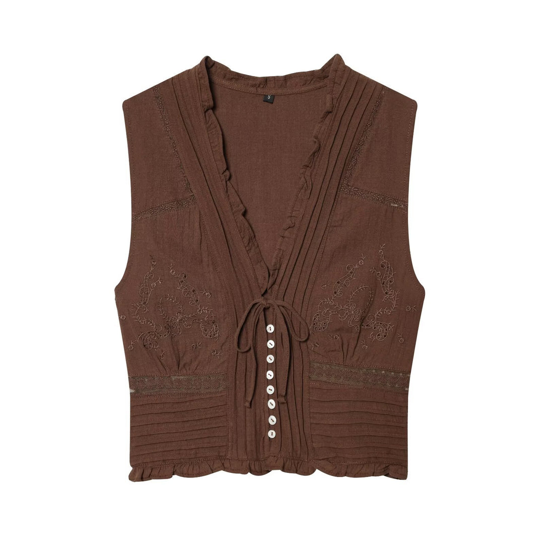 Dame Blusenshirt med fin drapering og dekorative knapdetaljer Skovae