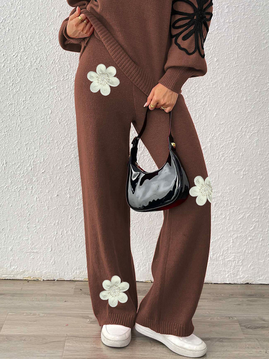 Dame strikbukser med blomstret design og bredt ben Stilla