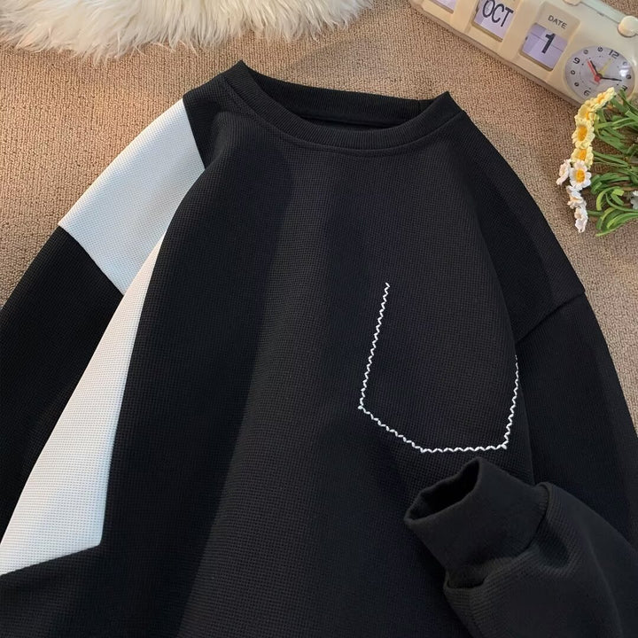 Dame mode sweatshirt med unikt design og praktisk brystlomme Stilla