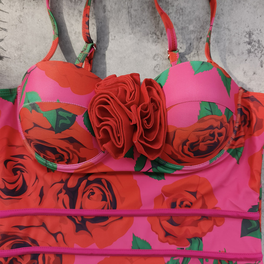 Dame badedragt med blomstret design og raffinerede stropdetaljer Stilla