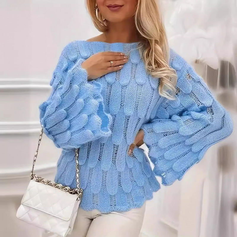 Kvinders strikket sweater med voluminøse ærmer og struktureret mønster Stilla