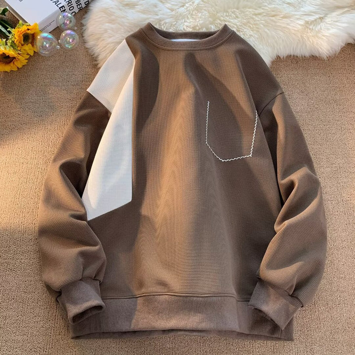 Dame mode sweatshirt med unikt design og praktisk brystlomme Stilla