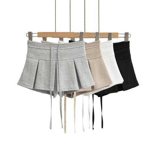 Dame sporty plisserede shorts med justerbar snor og elastisk talje Stilla