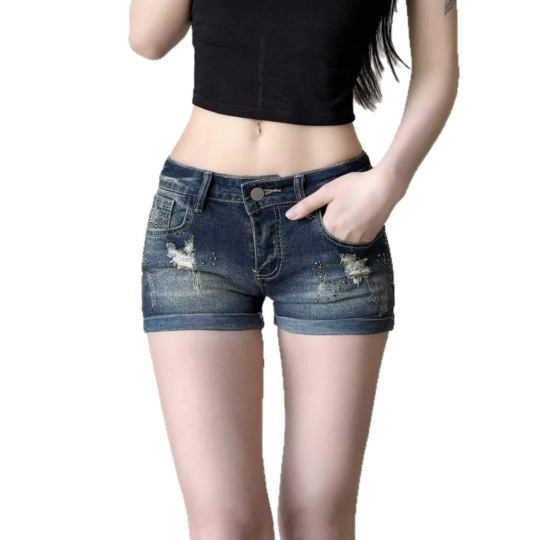 Dame jeans-shorts med glitrende accenter og moderigtigt design Skovae