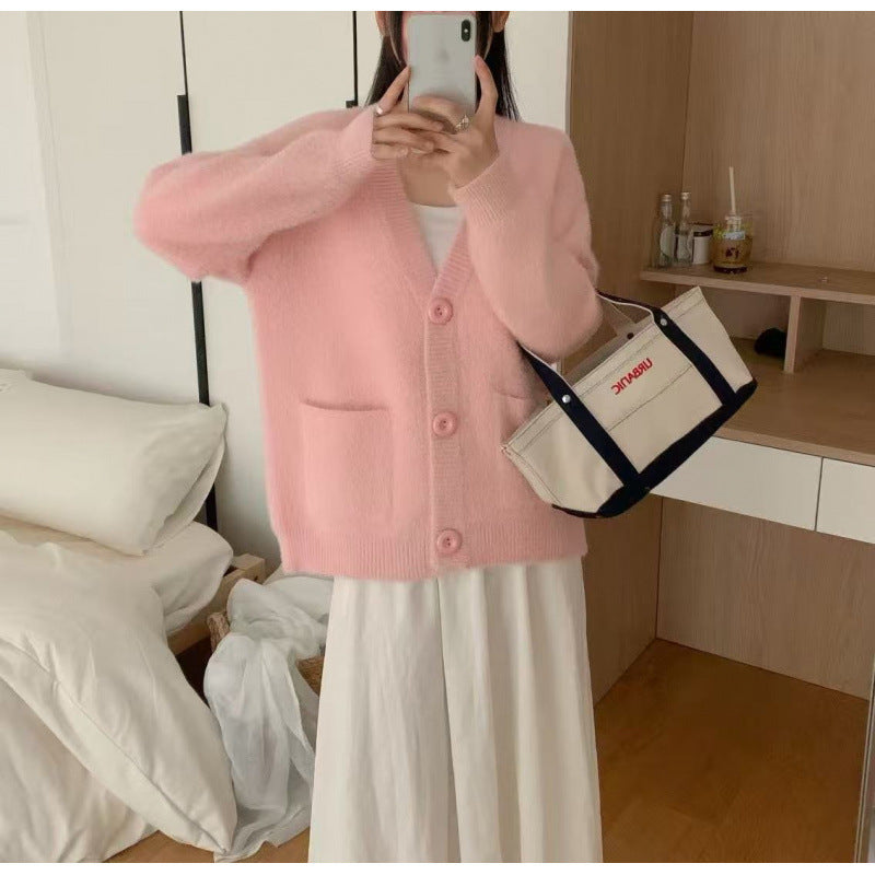 Kvinders fluffy knap cardigan med elegante lommer Stilla