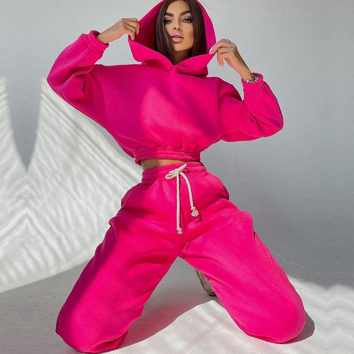 Kvinders sporty cropped sweat sæt med elastisk talje og praktiske lommer