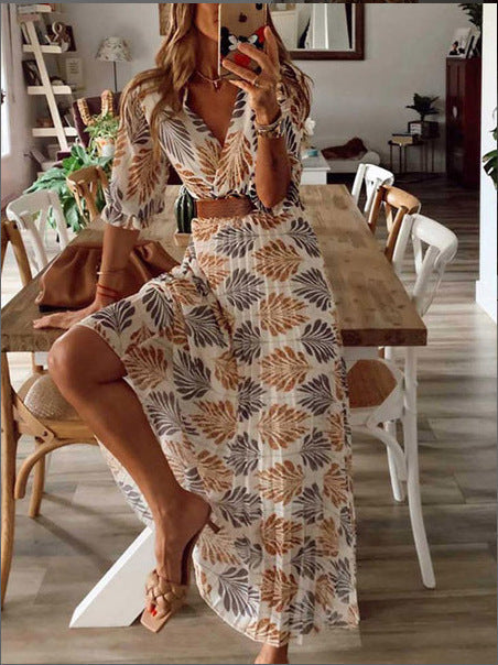 Dame Maxi-kjole med floralt mønster og feminin indpakningslook Stilla