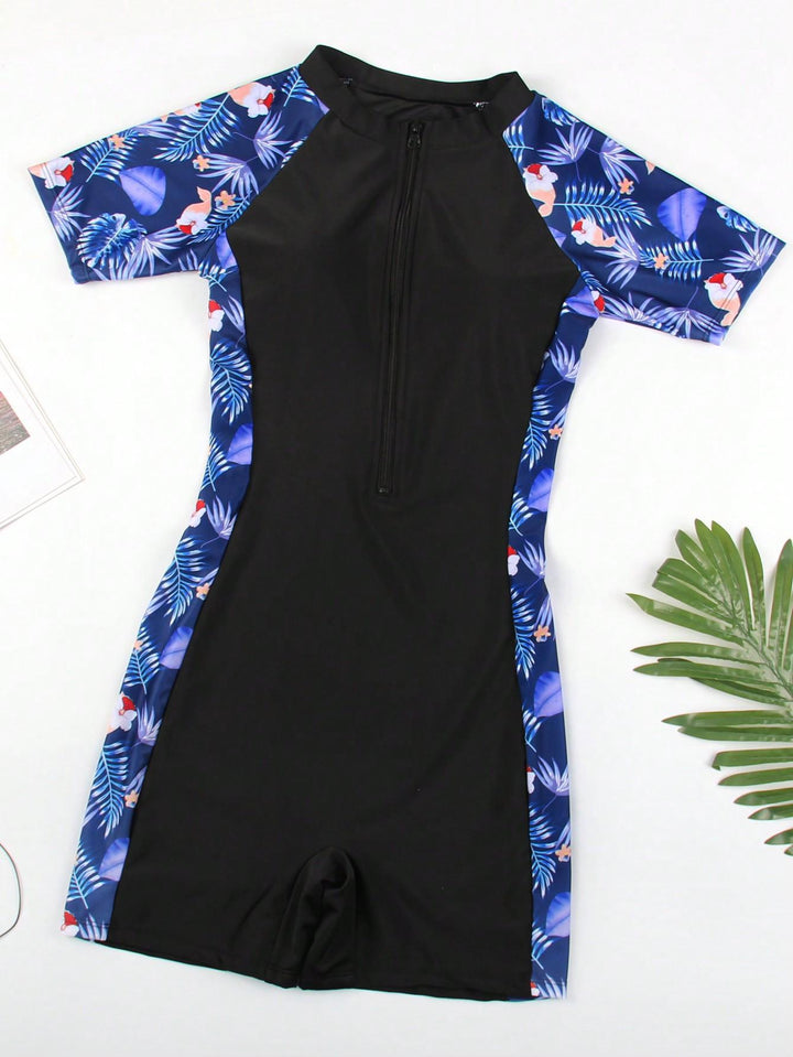 Dame sporty neoprendragt med kort arm og blomsterdesign Skovae