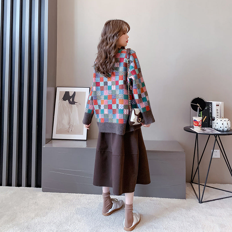 Dame stilfuld sweater med ternet mønster og casual snit Stilla