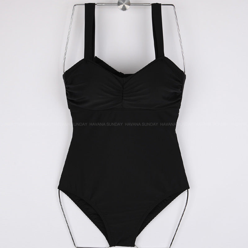 Dame jumpsuit badedragt med elegant flæsedesign og justerbare stropper Skovae