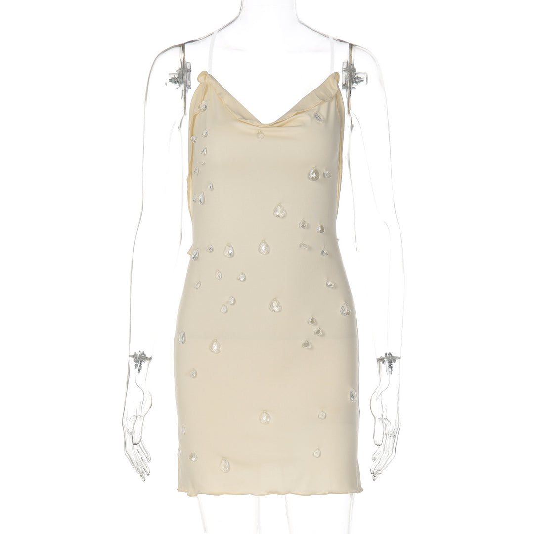 Dame figurformende minikjole med elegant drapering og transparente applikationer Skovae