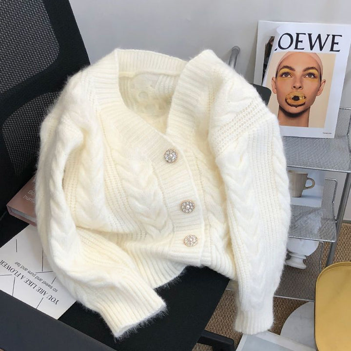 Kvindernes hyggelige cardigan med dekorativt kabelmønster og noble knapdetaljer Stilla
