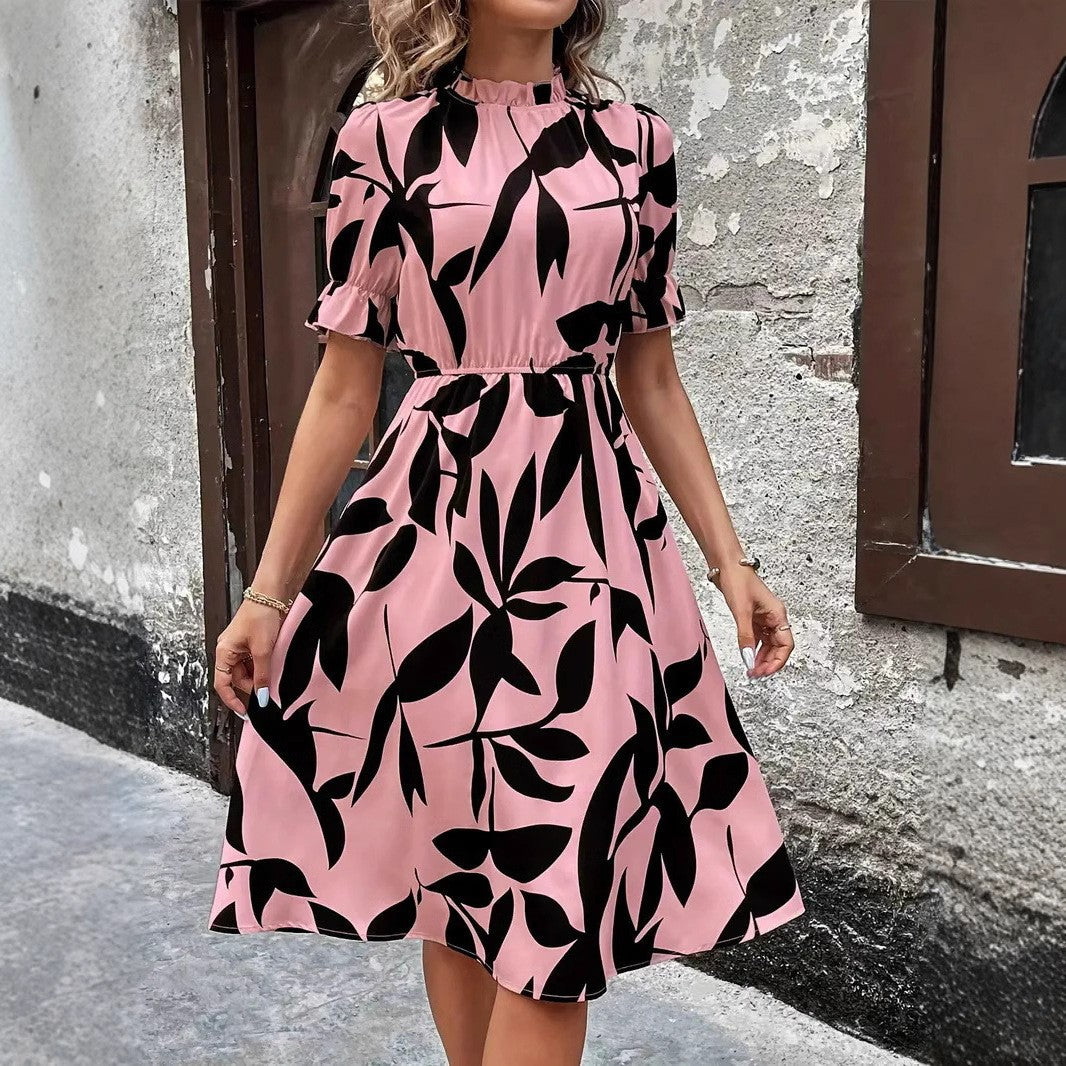Kvinders elegante midi kjole med stilfuldt plante mønster og elastisk talje Stilla
