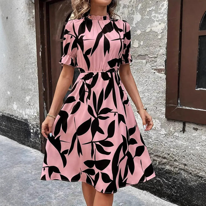 Kvinders elegante midi kjole med stilfuldt plante mønster og elastisk talje Stilla