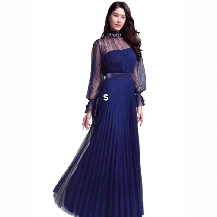 Kvindernes elegante maxi kjole med glitrende chiffon og legende flæse detaljer Skovae