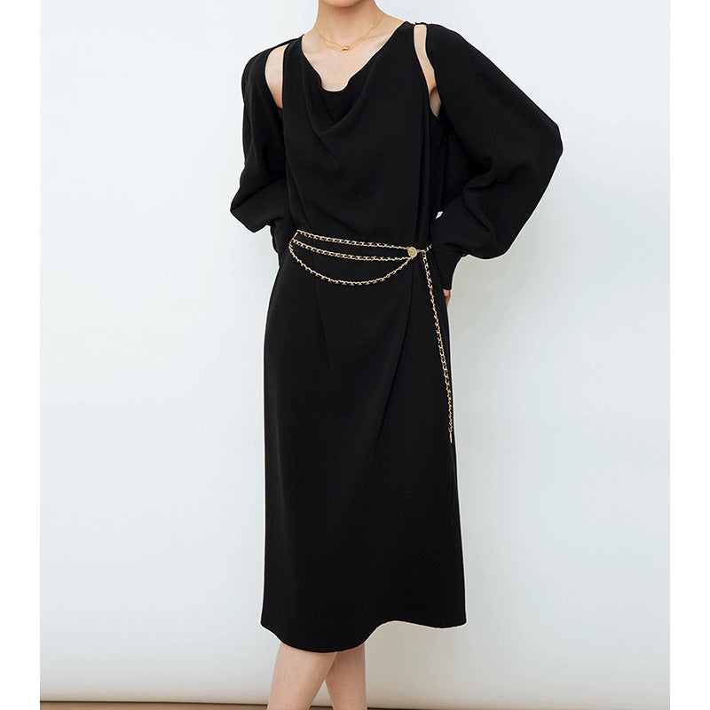 Dame elegant midi-kjole med voluminøse ærmer og feminin silhuet Stilla