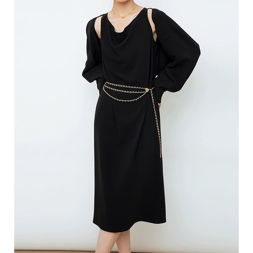Dame elegant midi-kjole med voluminøse ærmer og feminin silhuet Stilla