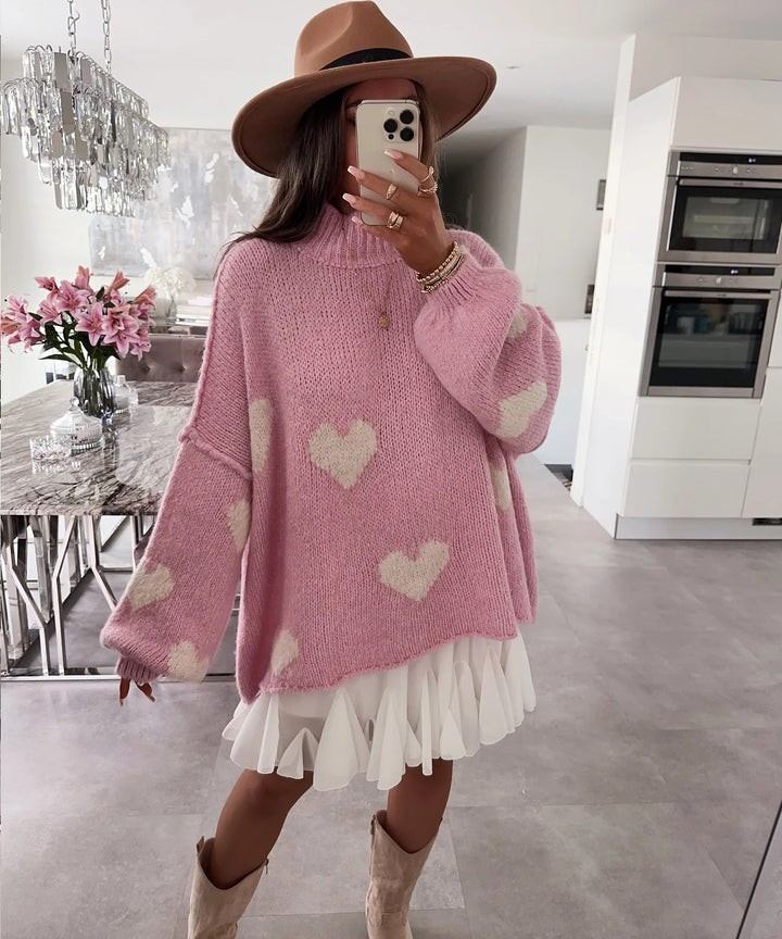 Kvindes moderigtige oversized sweater med hjerteformet mønster og voluminøse ærmer Stilla