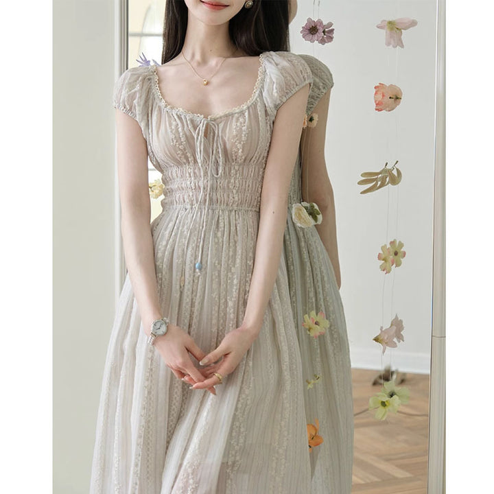 Dame Off-Shoulder Broderet Maxi-Kjole med Volantdetaljer Stilla