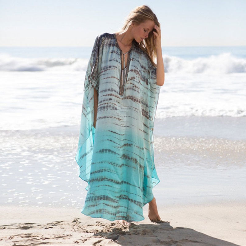 Dame luftig Strandkaftan med elegant bølgemønster og sidelukning Stilla