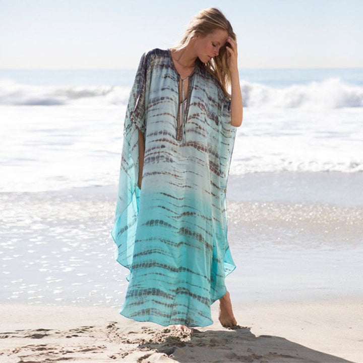 Dame luftig Strandkaftan med elegant bølgemønster og sidelukning Stilla