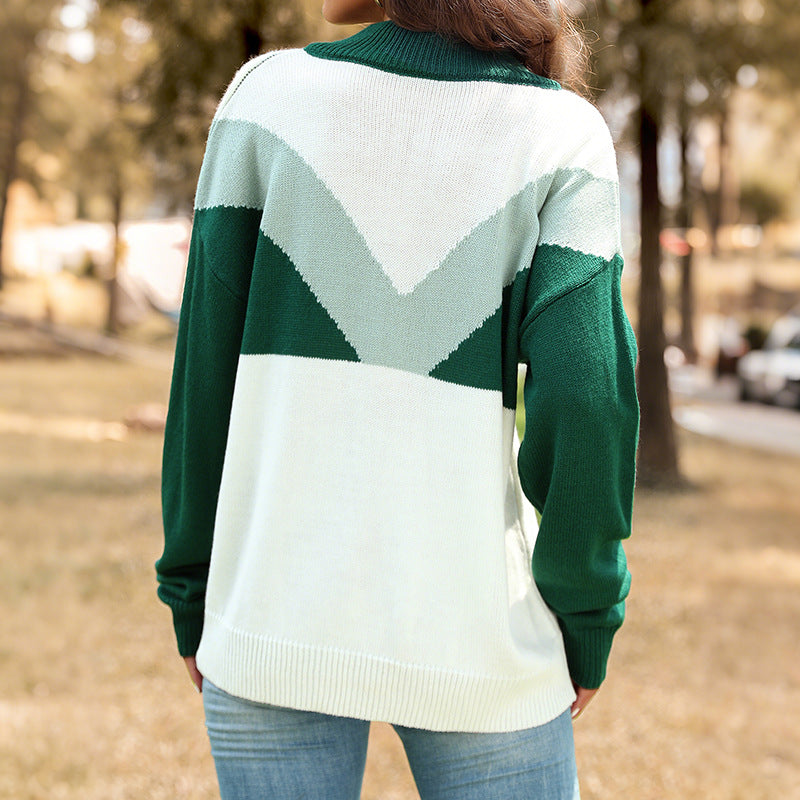 Dame sweater i moderne farveblok design med knapstolpe og høj krave Stilla
