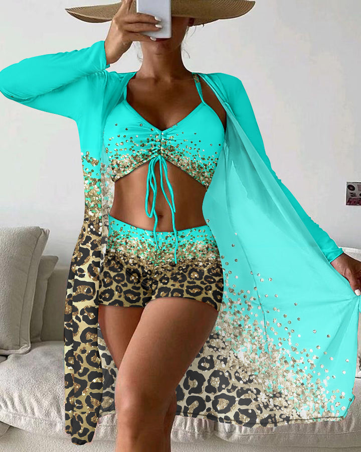 Dame strandoutfit med dyremønster og elegante accenter Stilla