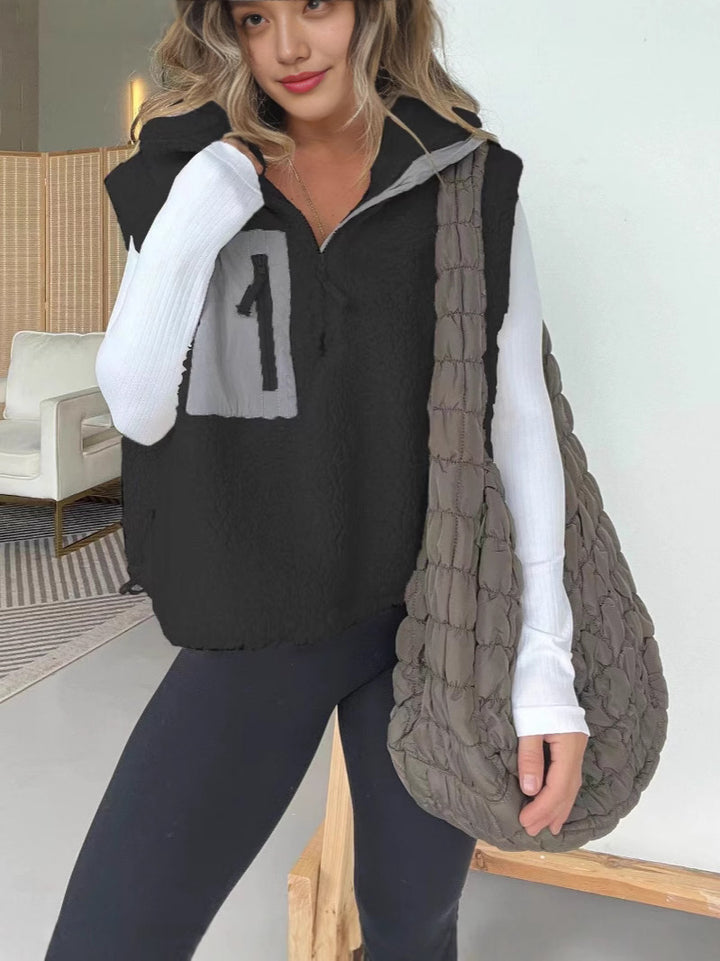 Kvinders quilted fleece vest med praktisk lynlås og imiteret pelslommer Stilla