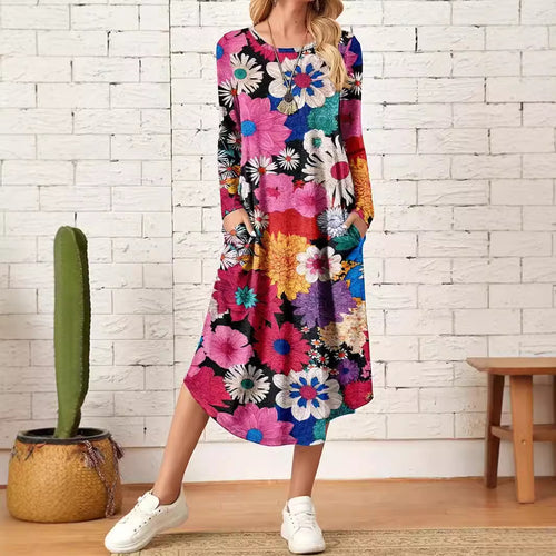 Dame blomsterkjole med praktiske sidelommer og løs pasform Stilla