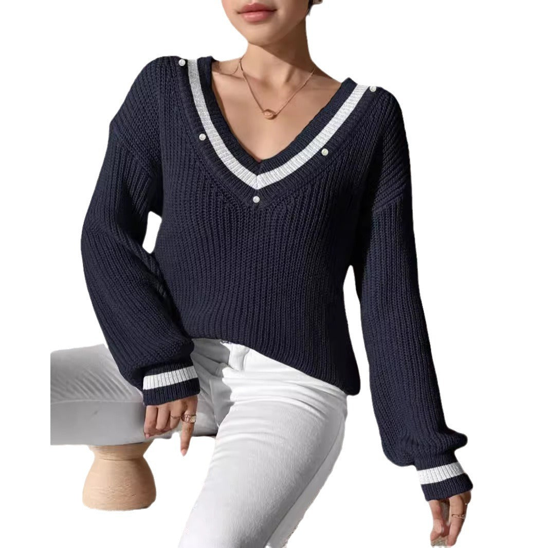 Kvinders oversized sweater med moderne V-hals og glamourøse perle accenter Stilla