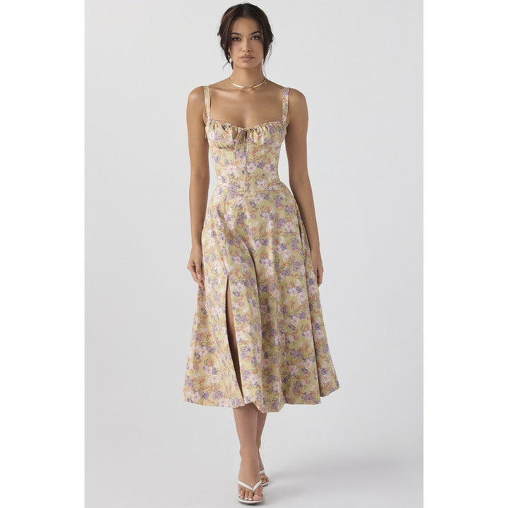 Dame maxikjole med floral design og elegant slids Skovae