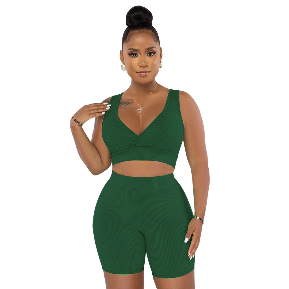 Dame Sporty Sæt af Cropped Top og Cykelshorts med Ribstruktur Stilla