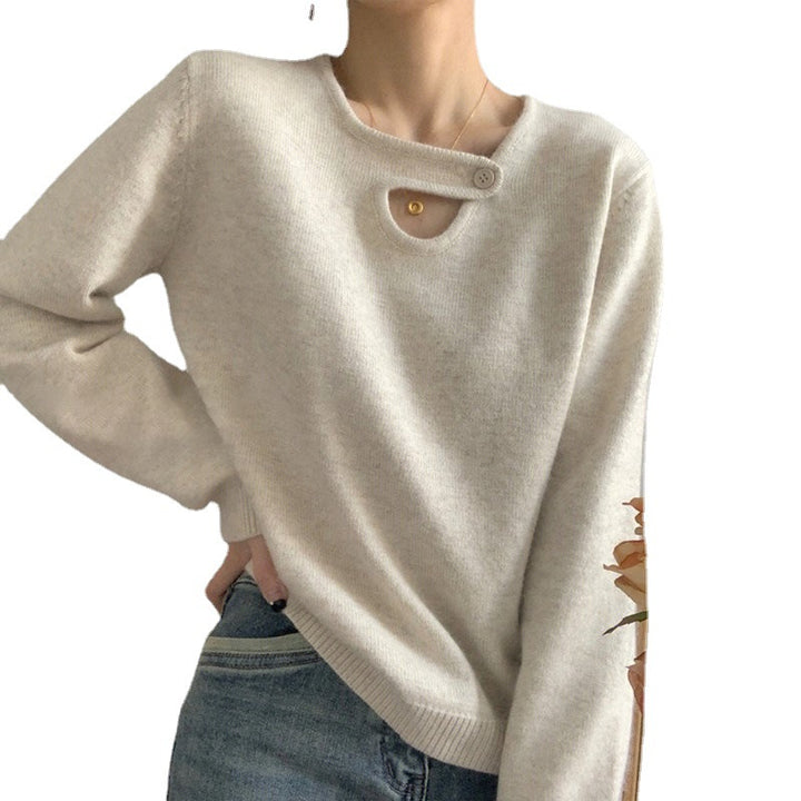 Kvindesweater med innovativ knapdetalje og afslappet skæring Stilla