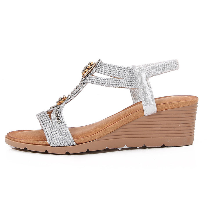 Dame sandaler med kilehæle og elegante udsmykninger Stilla