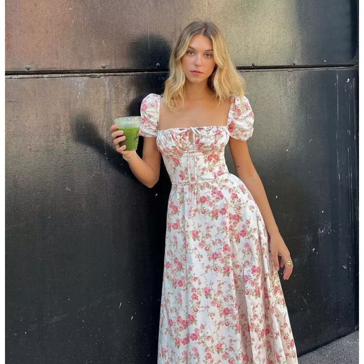 Dame Maxi-kjole med blomsterprint, puffærmer og høj slids Stilla
